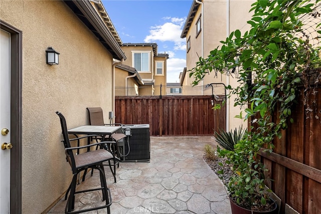341 W Pebble Creek Ln, Orange, CA 92865 - view of patio with central air condition unit and outdoor dining area