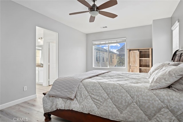 341 W Pebble Creek Ln, Orange, CA 92865 - bedroom with light wood-style flooring, baseboards, and a ceiling fan