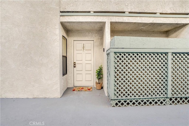 9038 Orion Ave Unit 107, North Hills, CA 91343 - property entrance featuring stucco siding