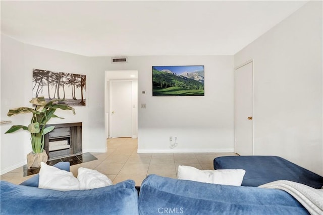 9038 Orion Ave Unit 107, North Hills, CA 91343 - living area featuring tile patterned flooring and a fireplace with flush hearth