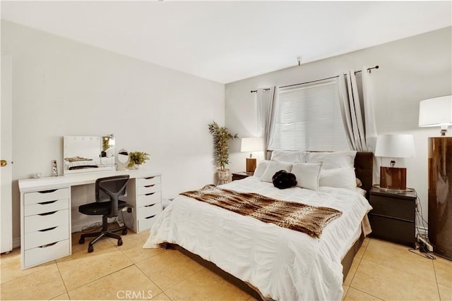 9038 Orion Ave Unit 107, North Hills, CA 91343 - bedroom with light tile patterned floors and a desk