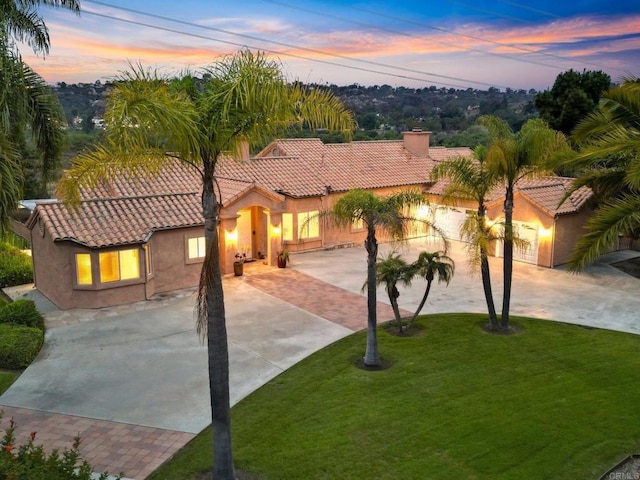 4036 Stonebridge Ln, Rancho Santa Fe, CA 92091 - mediterranean / spanish house featuring driveway, a tiled roof, stucco siding, and a chimney