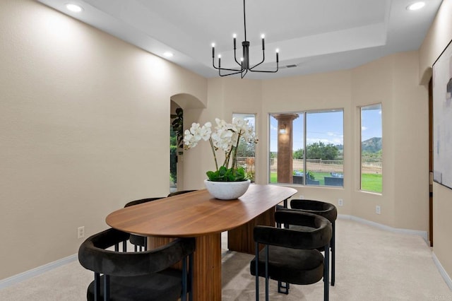4036 Stonebridge Ln, Rancho Santa Fe, CA 92091 - dining room featuring light carpet, recessed lighting, arched walkways, a chandelier, and baseboards