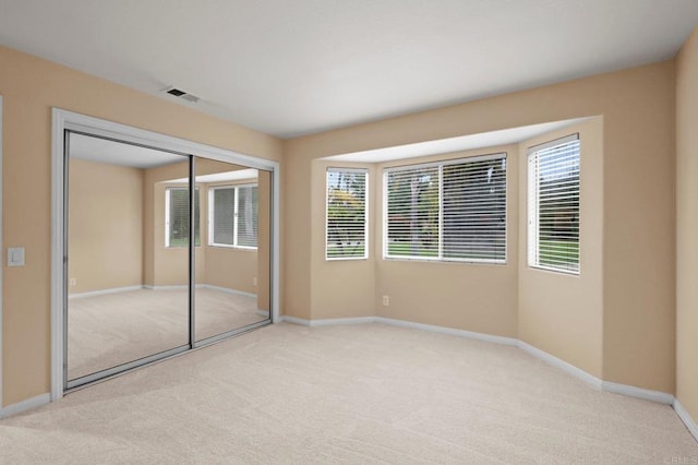 4036 Stonebridge Ln, Rancho Santa Fe, CA 92091 - unfurnished bedroom with light colored carpet, baseboards, and a closet