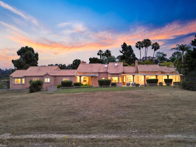 4036 Stonebridge Ln, Rancho Santa Fe, CA 92091 - mediterranean / spanish-style house featuring a chimney, a tiled roof, and stucco siding