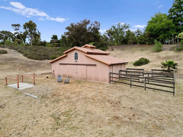 4036 Stonebridge Ln, Rancho Santa Fe, CA 92091 - view of yard with an outdoor structure and an outbuilding
