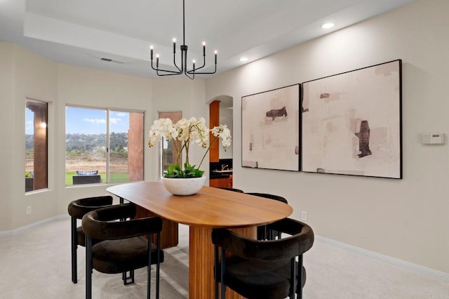 4036 Stonebridge Ln, Rancho Santa Fe, CA 92091 - dining space with baseboards, light carpet, recessed lighting, a chandelier, and arched walkways