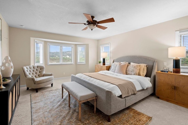 4036 Stonebridge Ln, Rancho Santa Fe, CA 92091 - carpeted bedroom featuring multiple windows, ceiling fan, and baseboards