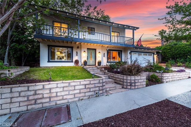 24751 Mosquero Ln, Mission Viejo, CA 92691 - view of front facade with a balcony, stucco siding, and an attached garage