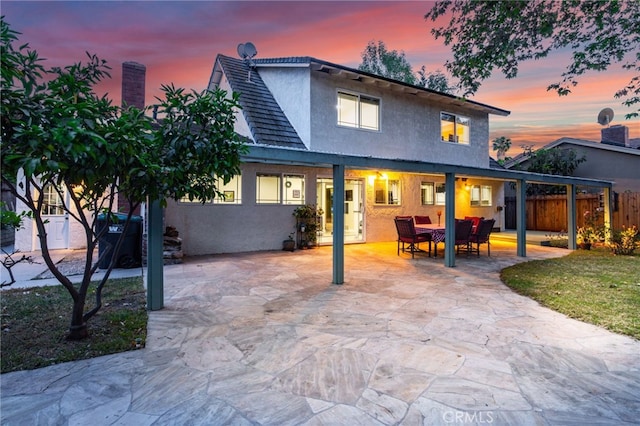 24751 Mosquero Ln, Mission Viejo, CA 92691 - back of house featuring stucco siding and a patio