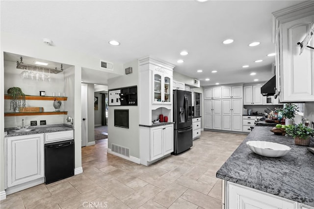 24751 Mosquero Ln, Mission Viejo, CA 92691 - kitchen featuring black appliances, white cabinets, recessed lighting, wall chimney range hood, and glass insert cabinets