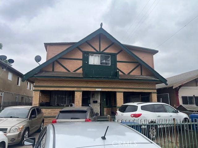 154 W 59th Pl, Los Angeles, CA 90003 - multi unit property with brick siding and covered porch