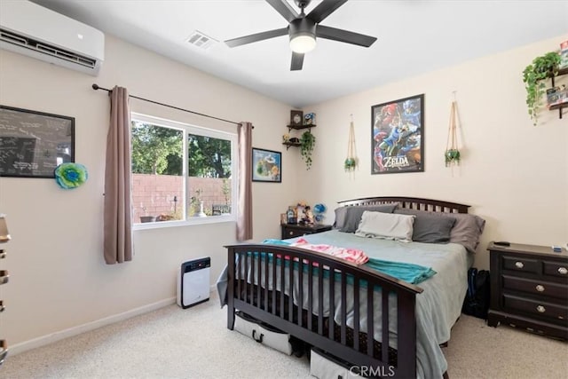350 E Nugent St, Lancaster, CA 93535 - carpeted bedroom featuring an AC wall unit, baseboards, and ceiling fan