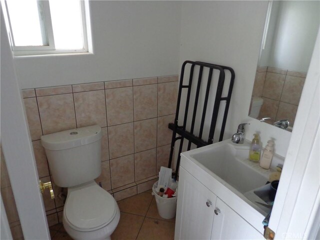 1908 Bailey Ave, Rosemead, CA 91770 - bathroom with tile walls, toilet, vanity, and a wainscoted wall