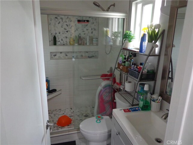 1908 Bailey Ave, Rosemead, CA 91770 - bathroom featuring a shower stall, toilet, and vanity