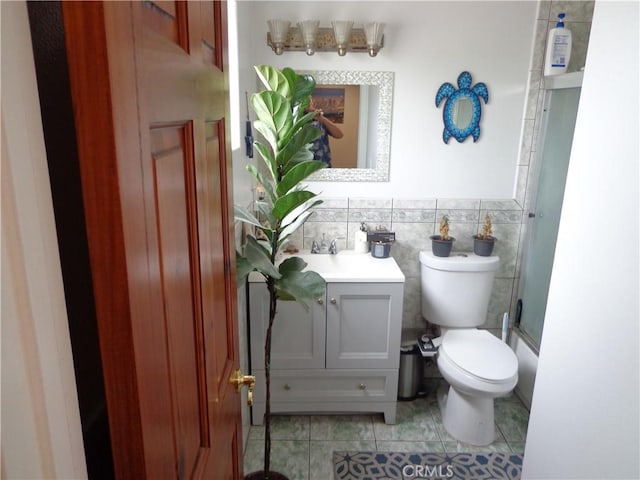 1908 Bailey Ave, Rosemead, CA 91770 - bathroom with vanity, toilet, tile patterned flooring, and a shower with door