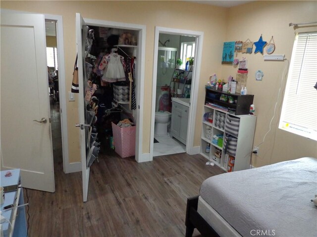 1908 Bailey Ave, Rosemead, CA 91770 - bedroom with wood finished floors, baseboards, and connected bathroom