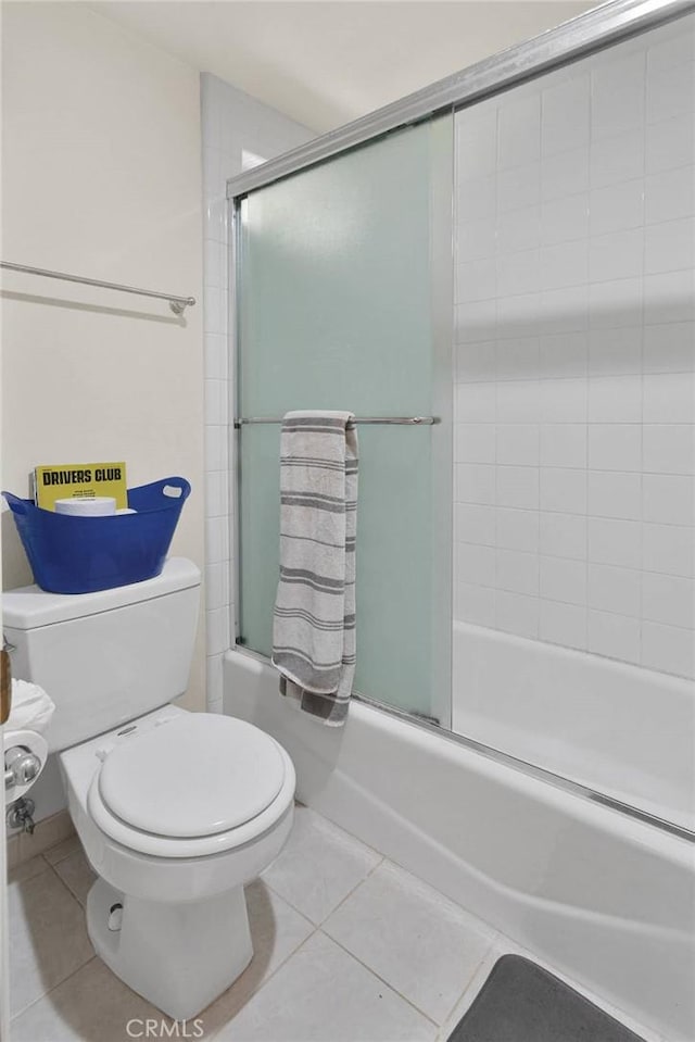 3537 Pinon Pines Rd, Wrightwood, CA 92397 - bathroom featuring tile patterned flooring, shower / bath combination with glass door, and toilet