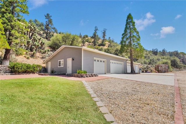 3537 Pinon Pines Rd, Wrightwood, CA 92397 - view of side of property featuring a lawn and a garage