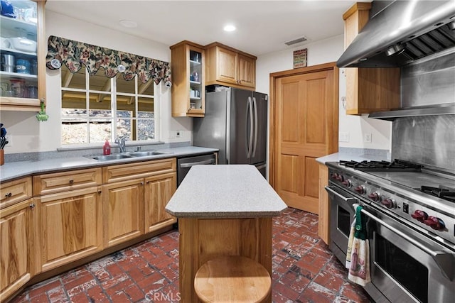 3537 Pinon Pines Rd, Wrightwood, CA 92397 - kitchen featuring wall chimney range hood, appliances with stainless steel finishes, a sink, brick floors, and light countertops