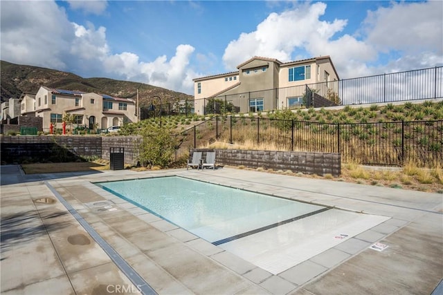 15820 Caterpillar Dr, Fontana, CA 92336 - community pool featuring a residential view and a mountain view