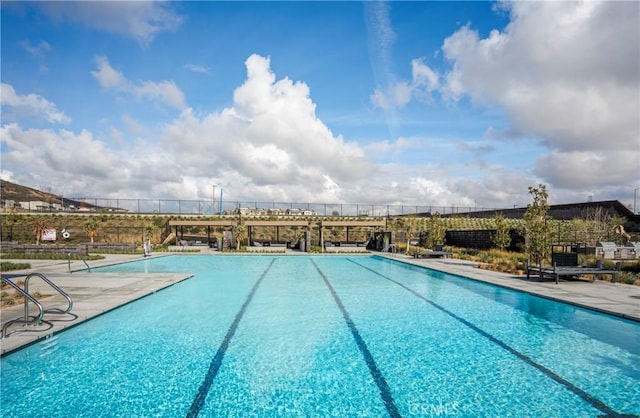 15820 Caterpillar Dr, Fontana, CA 92336 - community pool featuring a patio area