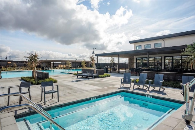 15820 Caterpillar Dr, Fontana, CA 92336 - community pool with a patio area