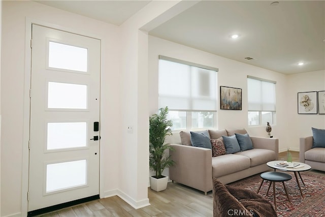 15820 Caterpillar Dr, Fontana, CA 92336 - entrance foyer featuring light wood-style flooring, baseboards, and recessed lighting