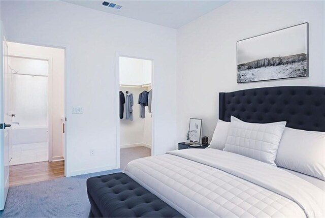 15820 Caterpillar Dr, Fontana, CA 92336 - carpeted bedroom with baseboards and a spacious closet