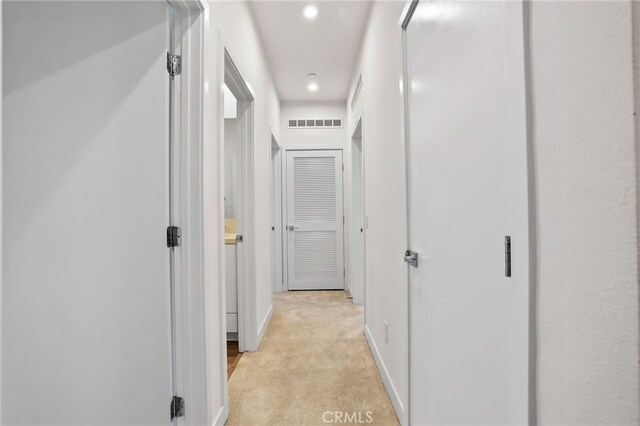 1914 W Bushell St, Anaheim, CA 92805 - corridor featuring light colored carpet, baseboards, and recessed lighting