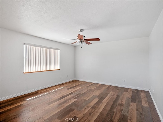 13951 Falling Leaf Rd, Apple Valley, CA 92307 - spare room with ceiling fan, baseboards, and wood finished floors
