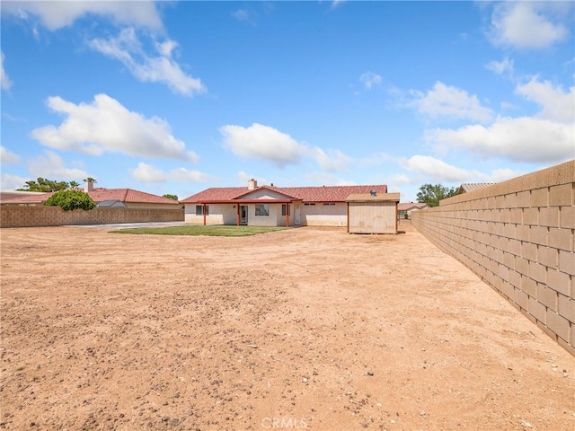 13951 Falling Leaf Rd, Apple Valley, CA 92307 - rear view of property featuring a fenced backyard