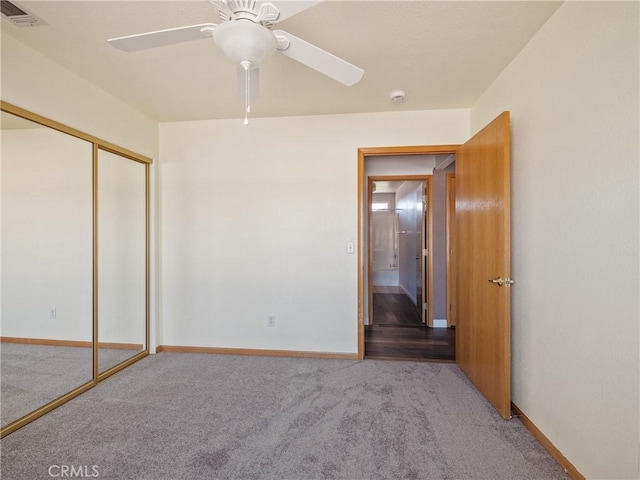 13951 Falling Leaf Rd, Apple Valley, CA 92307 - unfurnished bedroom featuring carpet, a closet, baseboards, and a ceiling fan