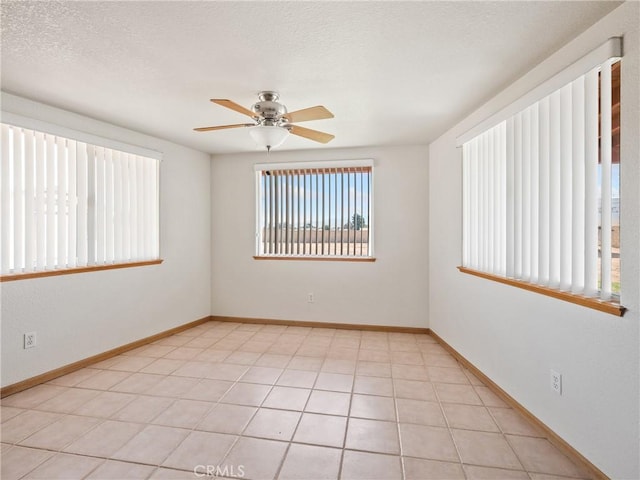 13951 Falling Leaf Rd, Apple Valley, CA 92307 - spare room featuring a ceiling fan and baseboards
