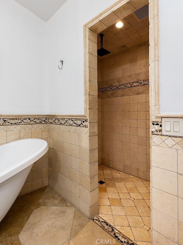 2212 Rim Rd, Duarte, CA 91008 - bathroom with tile walls, tiled shower, a freestanding bath, wainscoting, and recessed lighting