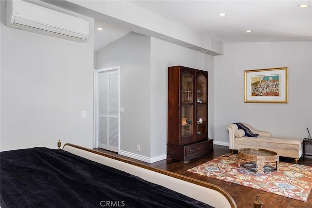 2212 Rim Rd, Duarte, CA 91008 - bedroom with a wall unit AC, wood finished floors, and recessed lighting