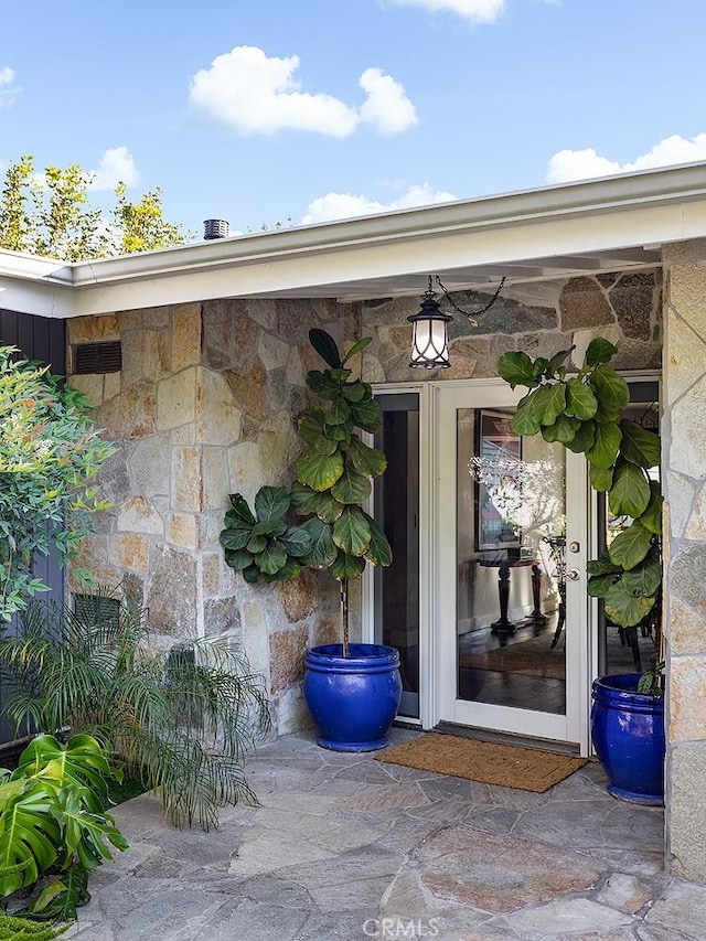 2212 Rim Rd, Duarte, CA 91008 - view of exterior entry featuring stone siding