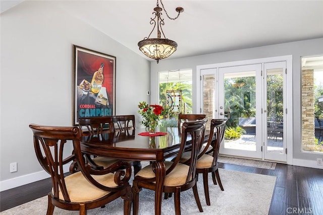 2212 Rim Rd, Duarte, CA 91008 - dining area featuring lofted ceiling and dark wood-style flooring
