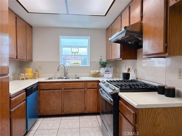 333 S Arroyo Dr Unit J, San Gabriel, CA 91776 - kitchen with gas stove, dishwasher, under cabinet range hood, a sink, and light countertops