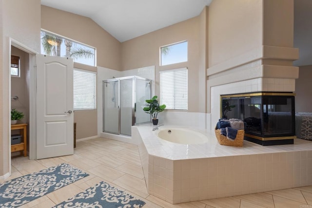 1394 Corte Magna, Oceanside, CA 92057 - full bath with a stall shower, a garden tub, tile patterned flooring, a tile fireplace, and high vaulted ceiling