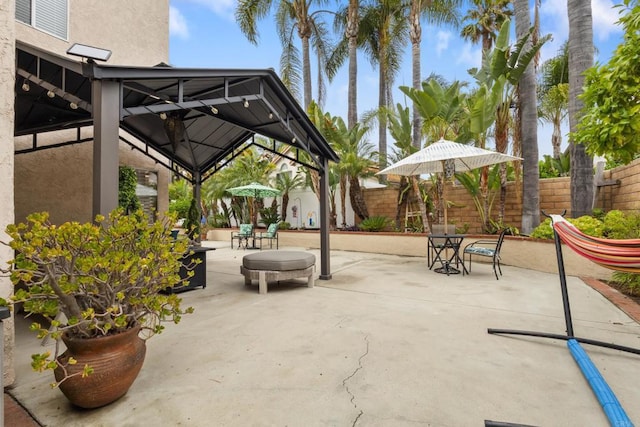 1394 Corte Magna, Oceanside, CA 92057 - fenced backyard featuring a gazebo, a patio, and outdoor dining area