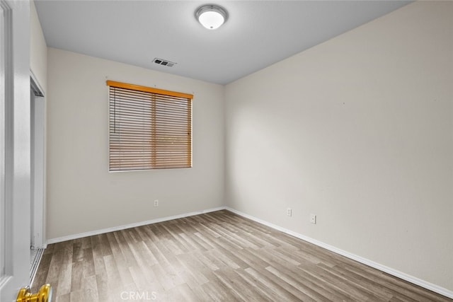 4616 W W Ave J2, Lancaster, CA 93536 - unfurnished bedroom with wood finished floors and baseboards