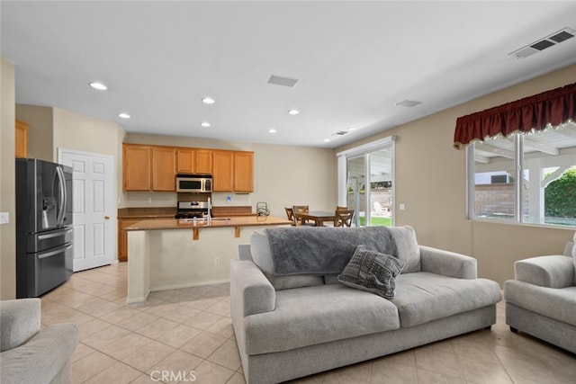 4616 W W Ave J2, Lancaster, CA 93536 - living area with light tile patterned flooring and recessed lighting