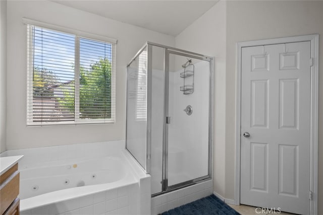 4616 W W Ave J2, Lancaster, CA 93536 - full bath featuring a shower stall, vanity, and a whirlpool tub