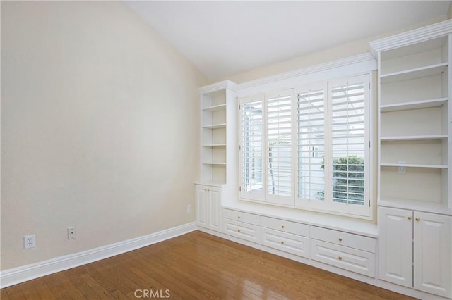 19 Byron Close, Laguna Niguel, CA 92677 - unfurnished room featuring hardwood / wood-style flooring, baseboards, and lofted ceiling