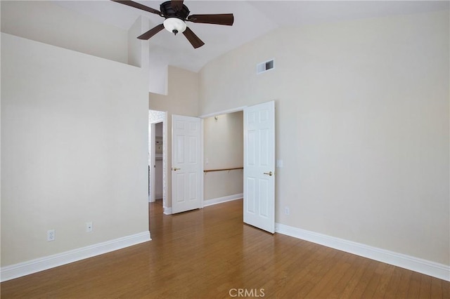 19 Byron Close, Laguna Niguel, CA 92677 - empty room with ceiling fan, high vaulted ceiling, wood finished floors, and baseboards