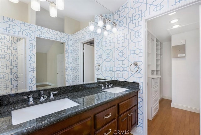 19 Byron Close, Laguna Niguel, CA 92677 - bathroom with double vanity, baseboards, wood finished floors, and wallpapered walls