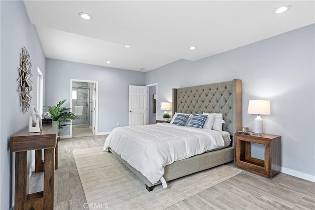 7321 Eglise Ave, Pico Rivera, CA 90660 - bedroom featuring light wood-type flooring, recessed lighting, and ensuite bath