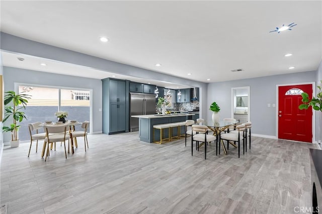 7321 Eglise Ave, Pico Rivera, CA 90660 - dining area with light wood-type flooring and recessed lighting