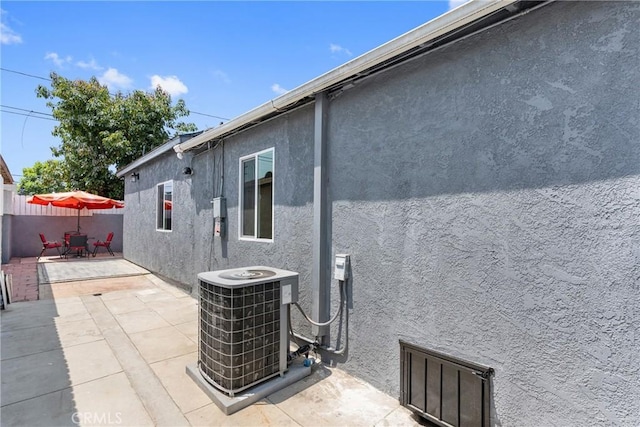 7321 Eglise Ave, Pico Rivera, CA 90660 - view of patio / terrace featuring cooling unit and outdoor dining area